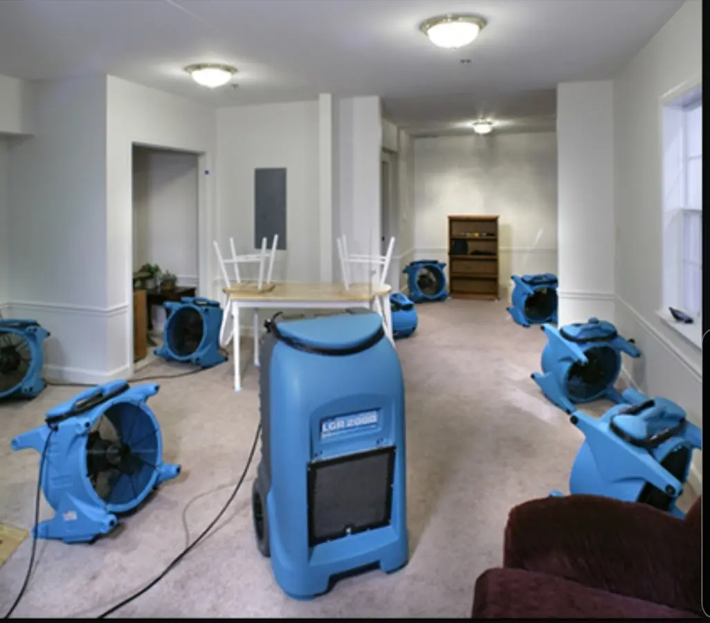 Air movers and dehumidifier setup for Water Damage Restoration in Waite Park